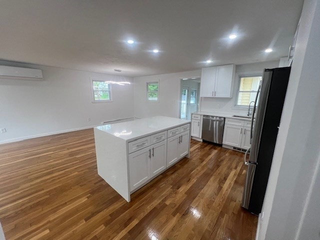 67 Hally Road Lowell, MA 01854 - Photo 6 of 19 a view of a hallway with washer and dryer