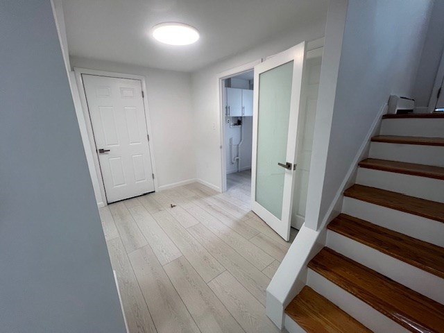 67 Hally Road Lowell, MA 01854 - Photo 8 of 19 wooden floor in an empty room