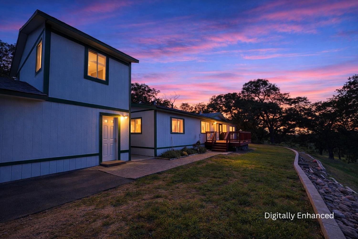 10580 Thompson Way Valley Springs, CA 95252 - Photo 1 of 64 a front view of a house with a yard