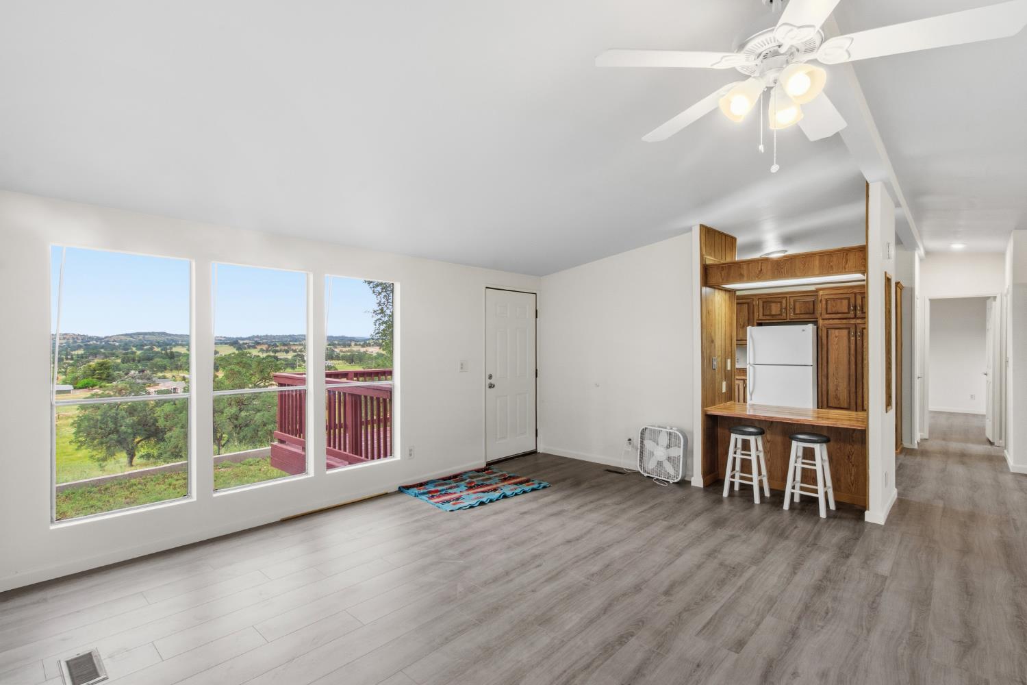 10580 Thompson Way Valley Springs, CA 95252 - Photo 11 of 64 wooden floor in an empty room with a window