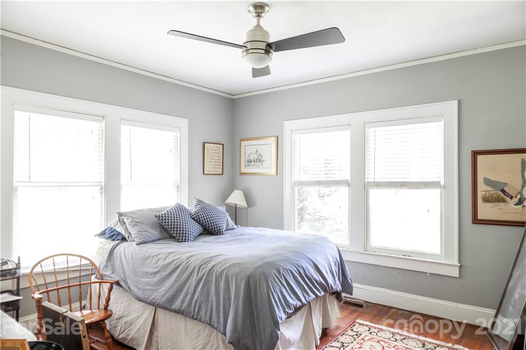 3511 Tuckaseegee Road Charlotte, NC 28208 - Photo 22 of 43 a bedroom with a bed and a window