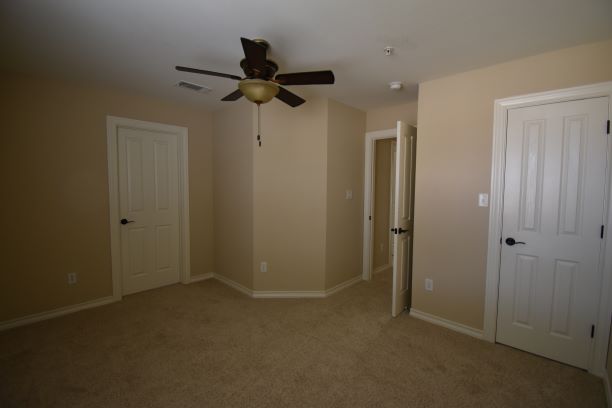 15918 Windermere Drive, Unit 315 Pflugerville, TX 78660 - Photo 12 of 13 wooden floor in an empty room