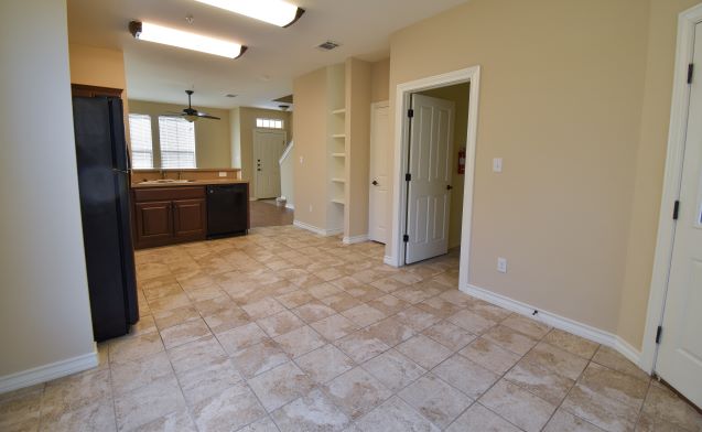 15918 Windermere Drive, Unit 315 Pflugerville, TX 78660 - Photo 5 of 13 a view of a hallway to kitchen and a window