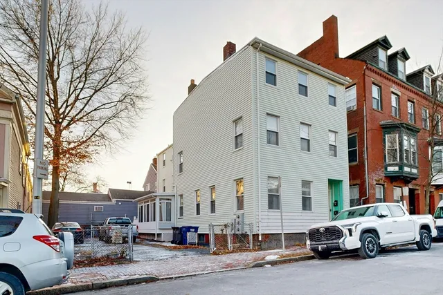 a car parked in front of a building