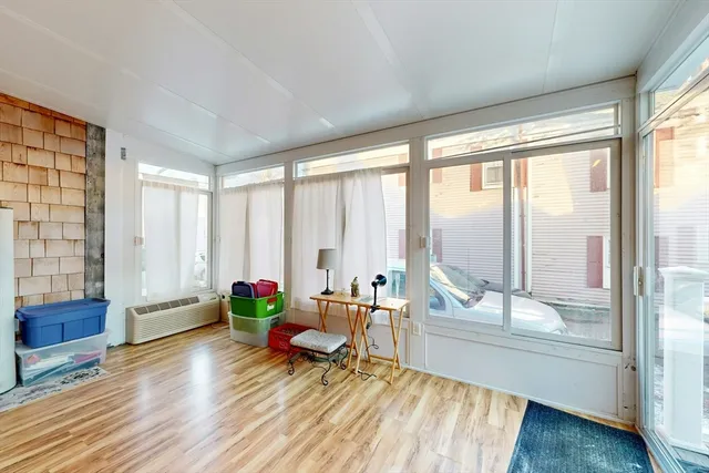 a view of staircase with railing and white walls