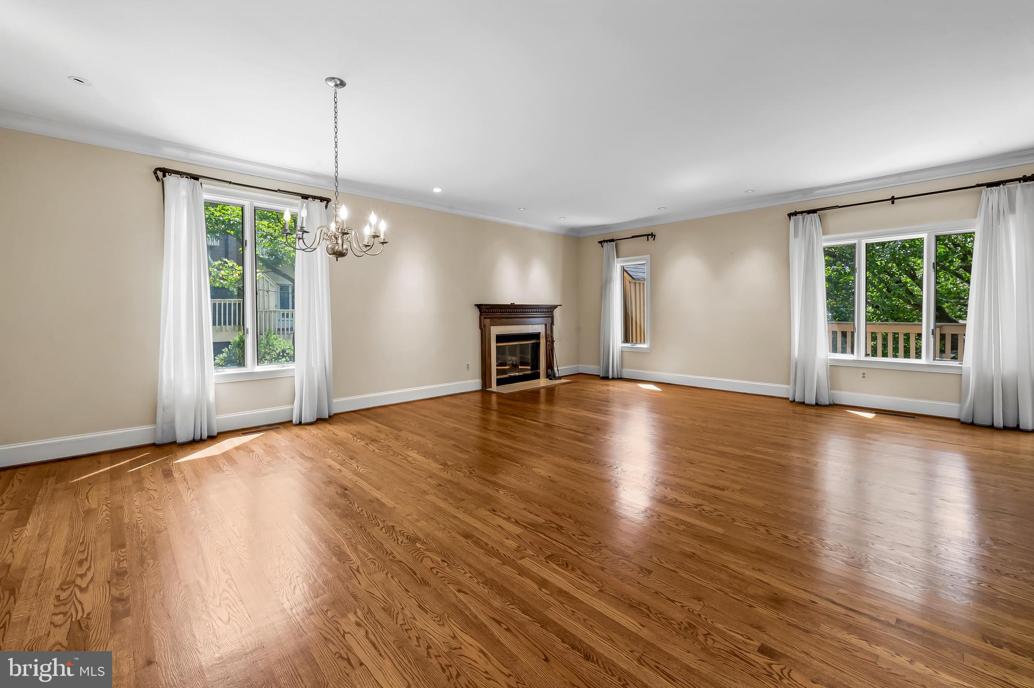 5700 Coley Court Baltimore, MD 21210 - Photo 11 of 53 a view of an empty room with wooden floor and a window
