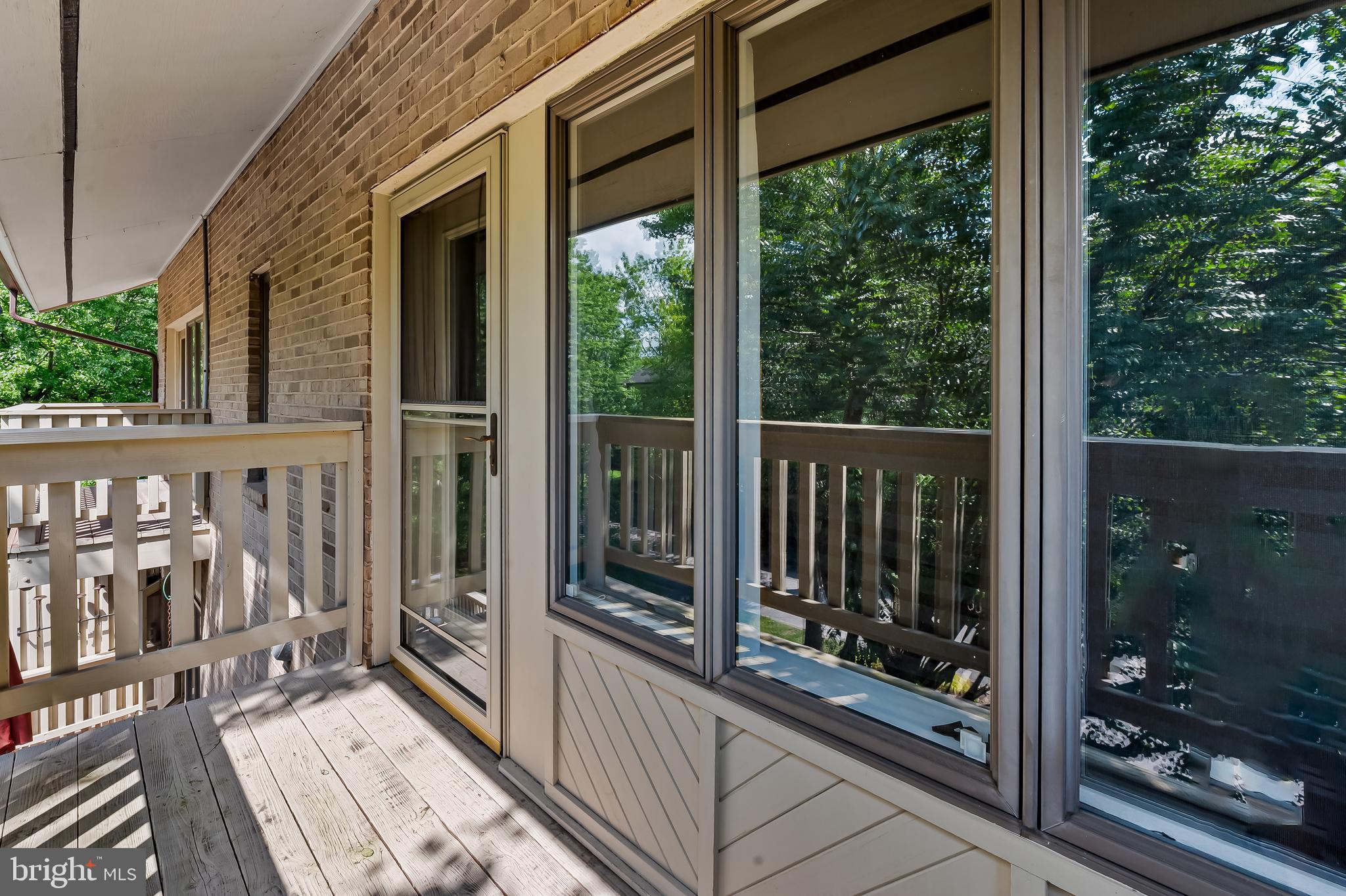 5700 Coley Court Baltimore, MD 21210 - Photo 31 of 53 a view of a balcony with wooden floor