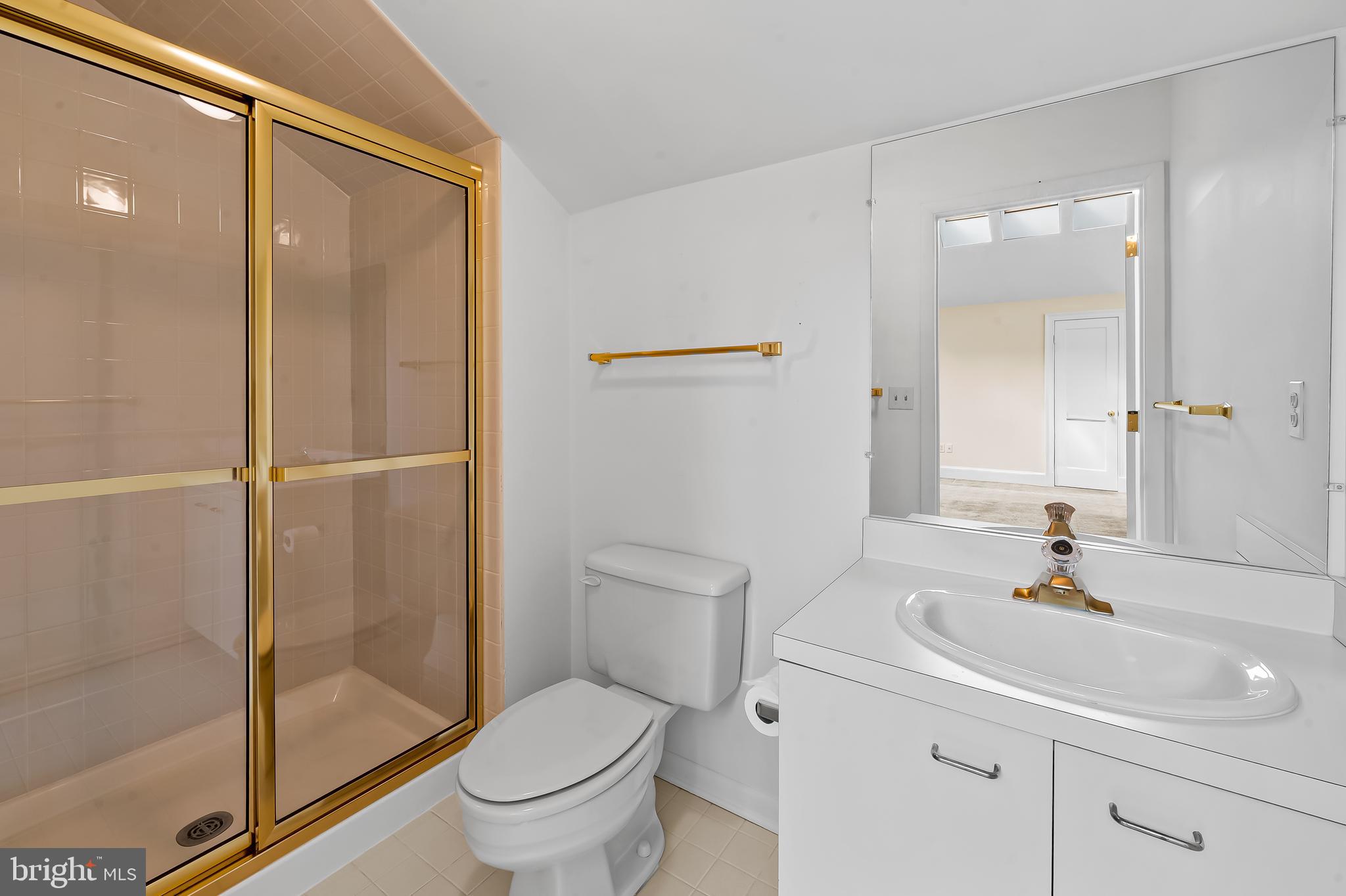 5700 Coley Court Baltimore, MD 21210 - Photo 36 of 53 a bathroom with a sink a toilet and shower