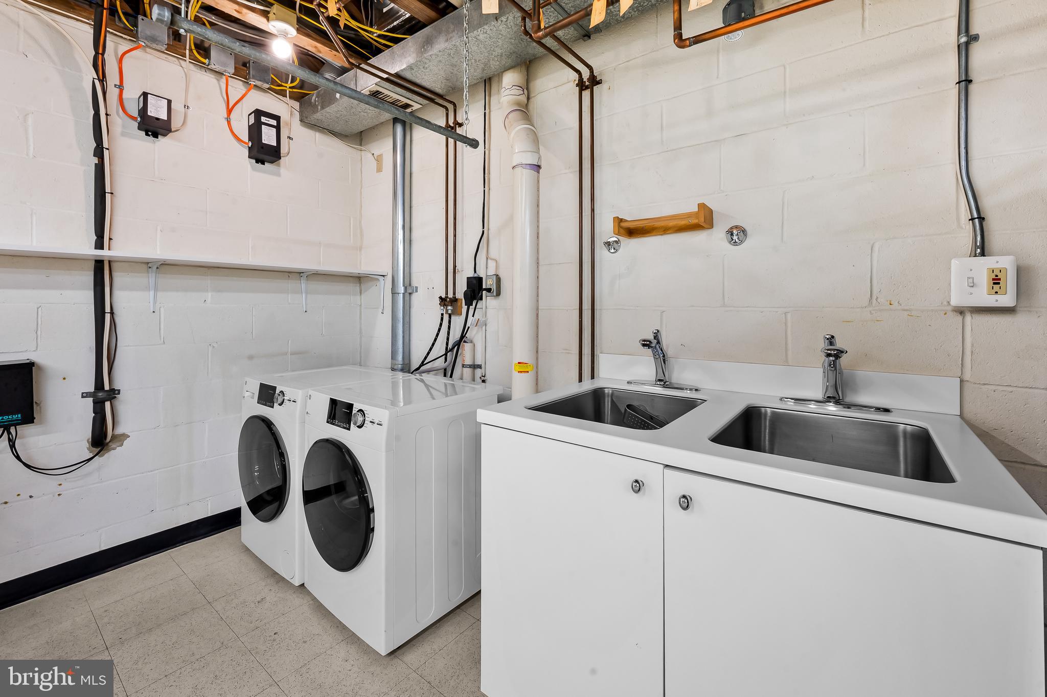 5700 Coley Court Baltimore, MD 21210 - Photo 41 of 53 a utility room with dryer and washer