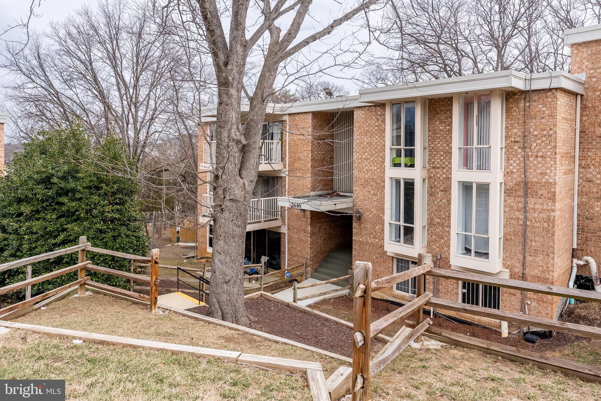 2616 Fort Farnsworth Road, Unit 242 Alexandria, VA 22303 - Photo 3 of 6 a view of house with backyard and seating space