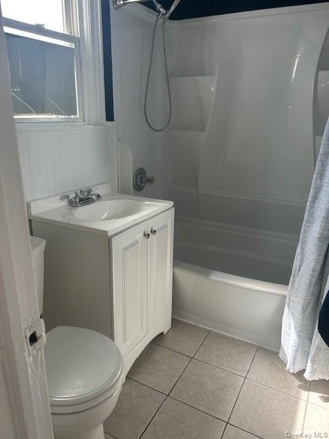 309 South Broadway, Unit 2 UPPER LEVEL Lindenhurst, NY 11757 - Photo 7 of 13 a bathroom with a sink a toilet and shower