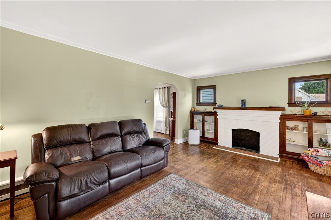 305 Newcastle Road Geddes, NY 13219 - Photo 10 of 29 Greatroom with decorative fireplace
