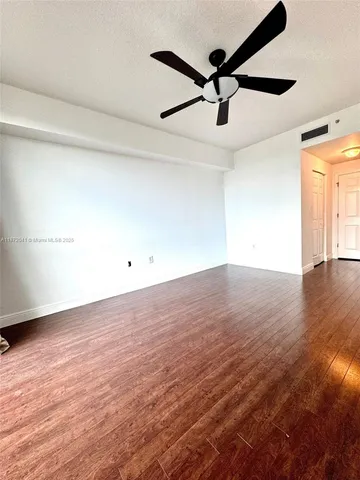 a view of a glass door and the window