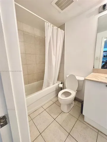 a swimming pool with outdoor seating and yard