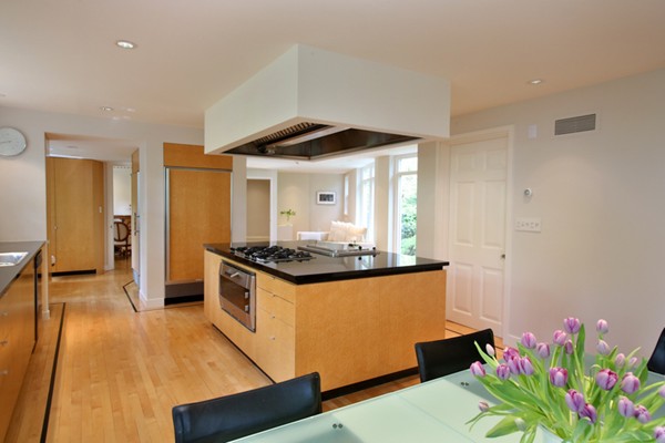 35 Wykeham Road Newton, MA 02465 - Photo 4 of 7 a kitchen with stainless steel appliances granite countertop a stove and a refrigerator