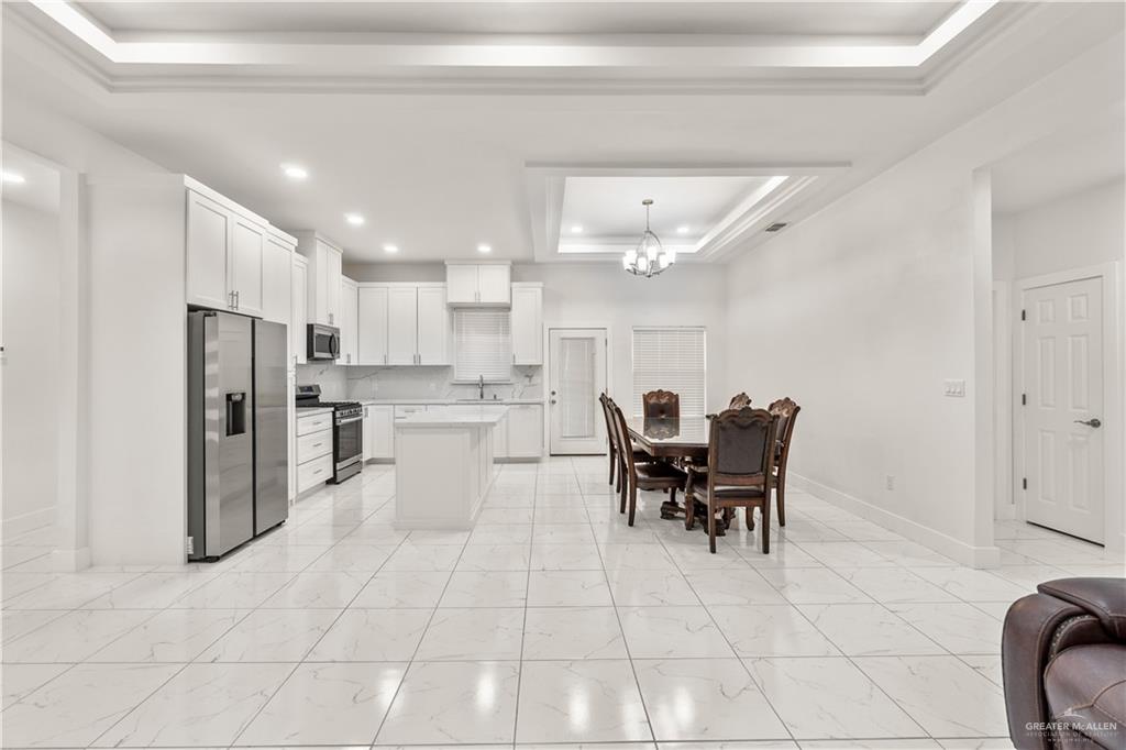 23232 Val Verde Road Edcouch, TX 78538 - Photo 4 of 19 a view of kitchen with refrigerator and chairs