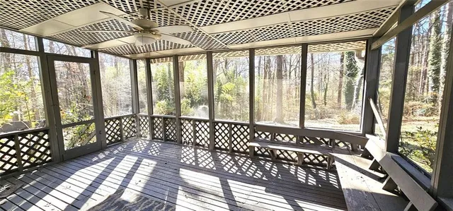 a view of entryway with wooden floor