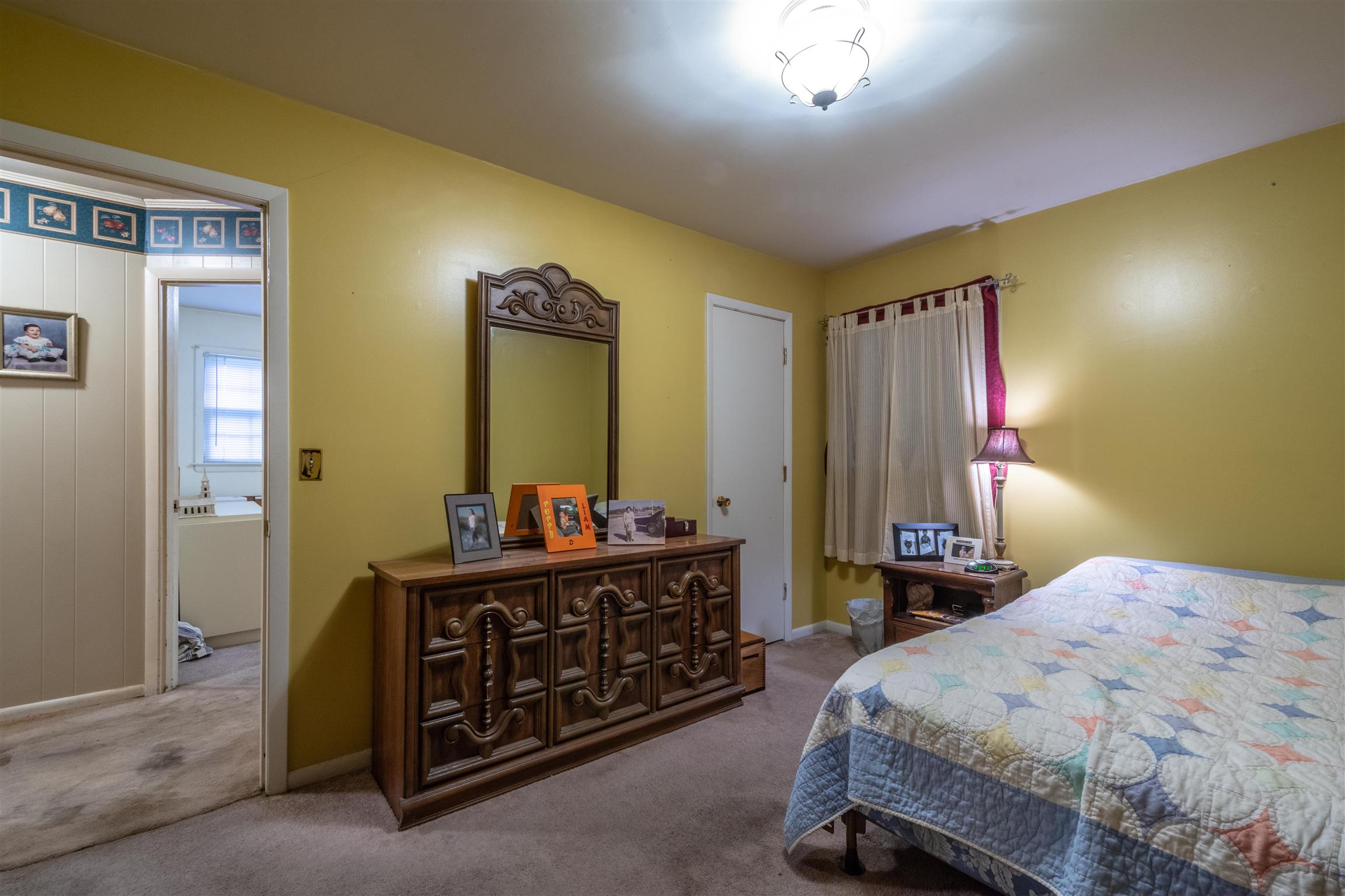 1309 Oak Grove Road Goodspring, TN 38460 - Photo 18 of 29 a bedroom with a bed and a dresser
