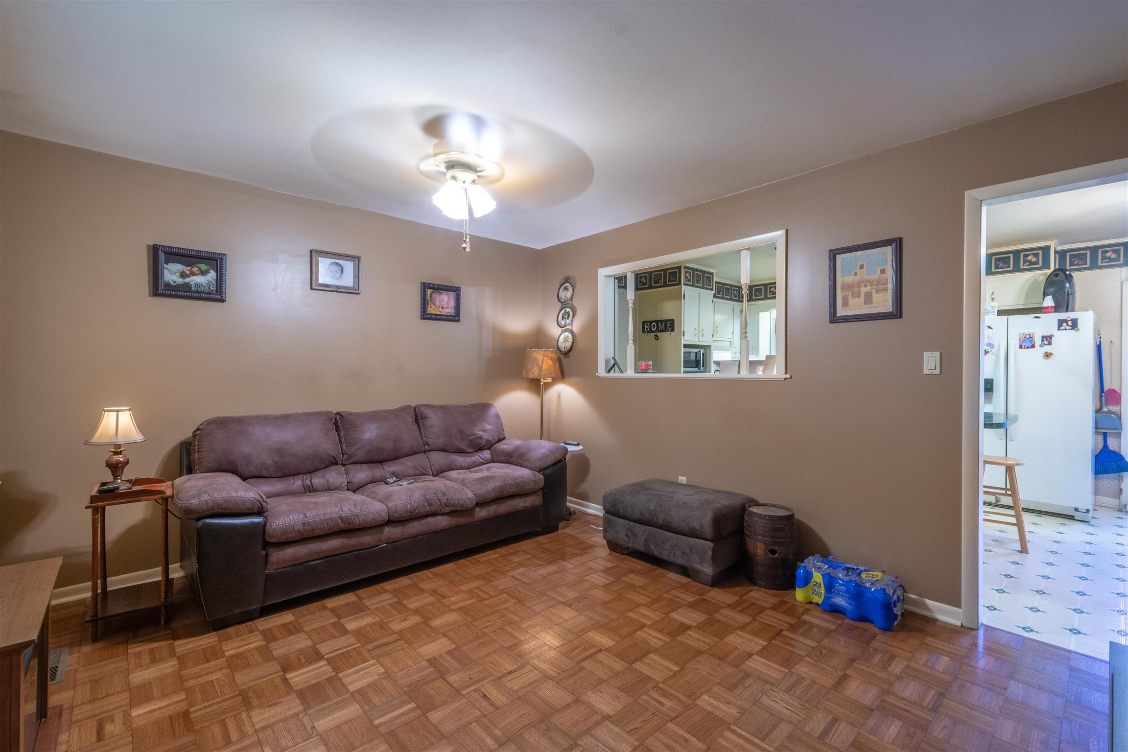 1309 Oak Grove Road Goodspring, TN 38460 - Photo 2 of 29 a living room with furniture and a chandelier
