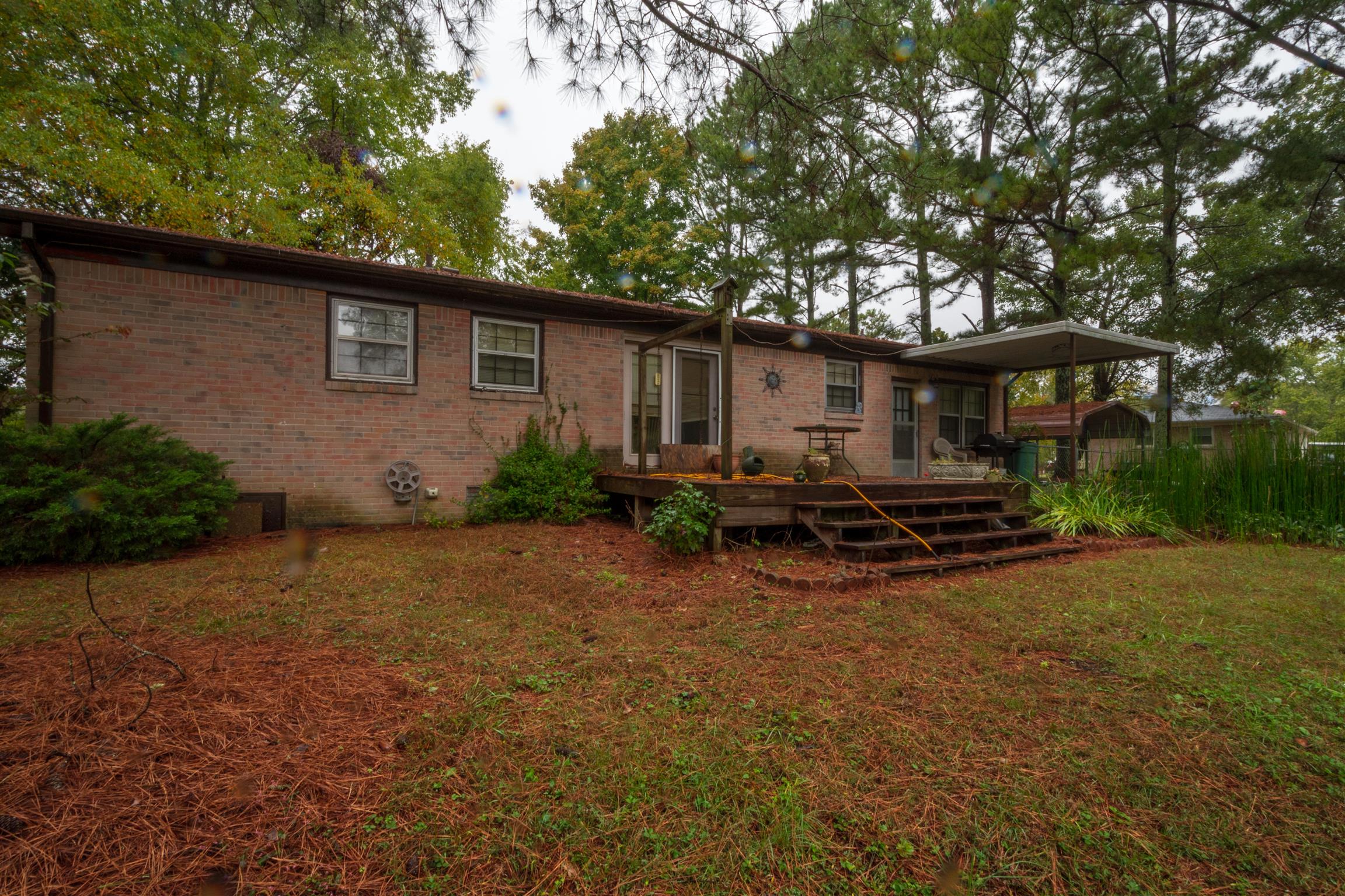 1309 Oak Grove Road Goodspring, TN 38460 - Photo 24 of 29 a view of a house with backyard and sitting area