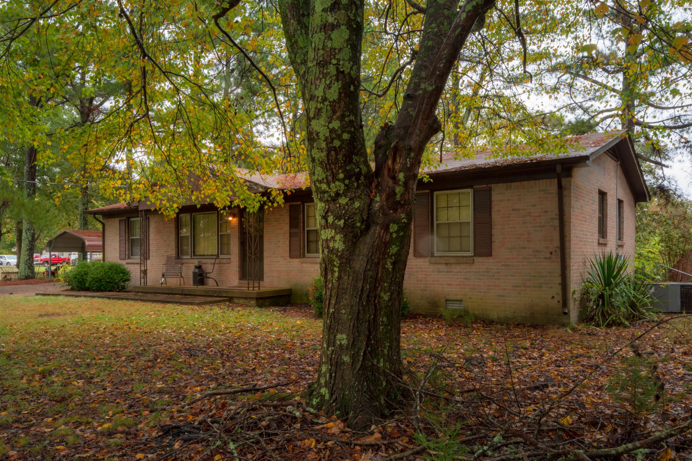1309 Oak Grove Road Goodspring, TN 38460 - Photo 28 of 29 a view of a house with a tree in front of it