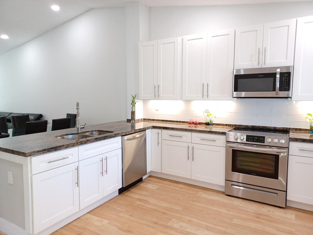 360 Northwest 67th Street, Unit E203 Boca Raton, FL 33487 - Photo 2 of 13 001Kitahen1jpg