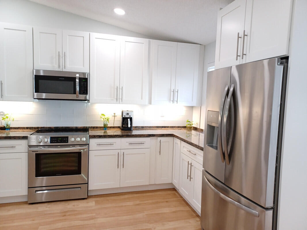 360 Northwest 67th Street, Unit E203 Boca Raton, FL 33487 - Photo 3 of 13 002Kitchen2jpg