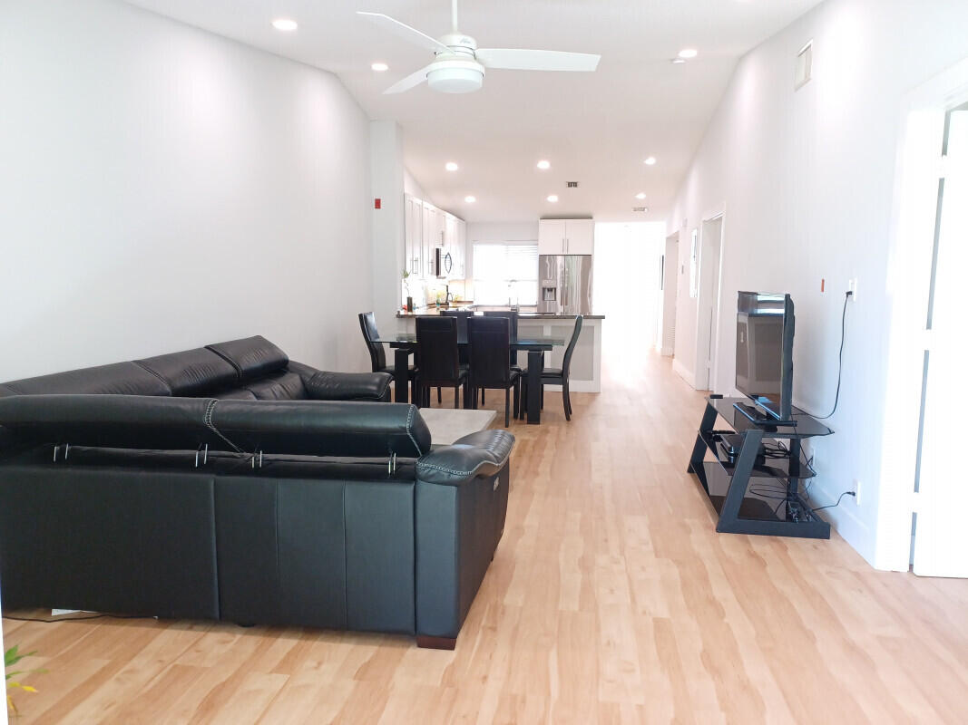 360 Northwest 67th Street, Unit E203 Boca Raton, FL 33487 - Photo 5 of 13 004Livingroom1jpg
