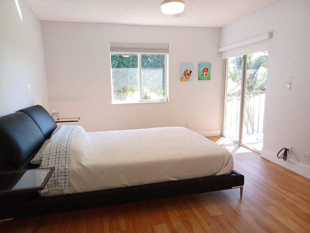 360 Northwest 67th Street, Unit E203 Boca Raton, FL 33487 - Photo 8 of 13 007Masterbedroom1jpg