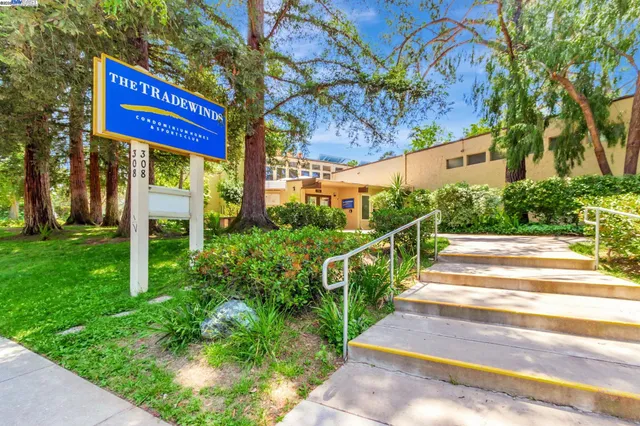 a view of sign board with yard