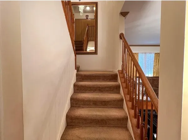 a view of wooden staircase