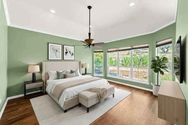a view of room with window and wooden floor