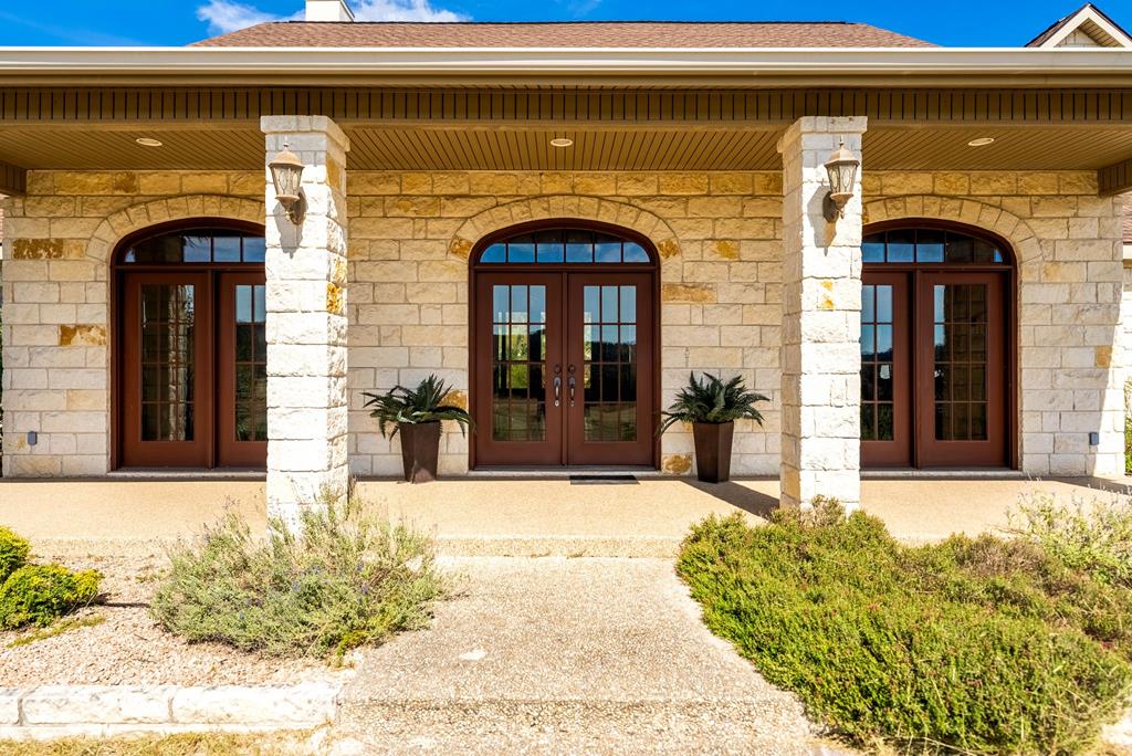 103 Cranbrook Court Ingram, TX 78025 - Photo 2 of 61 a view of a entryway door front of a building