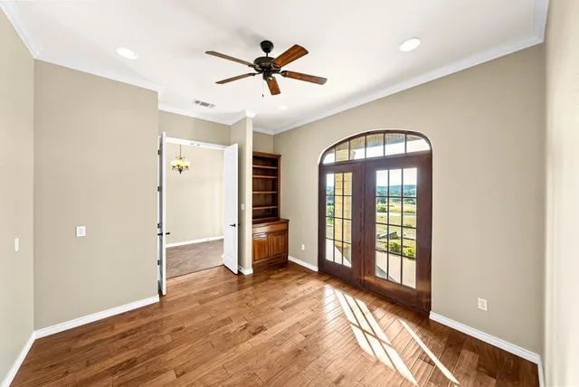 a view of a hallway with staircase