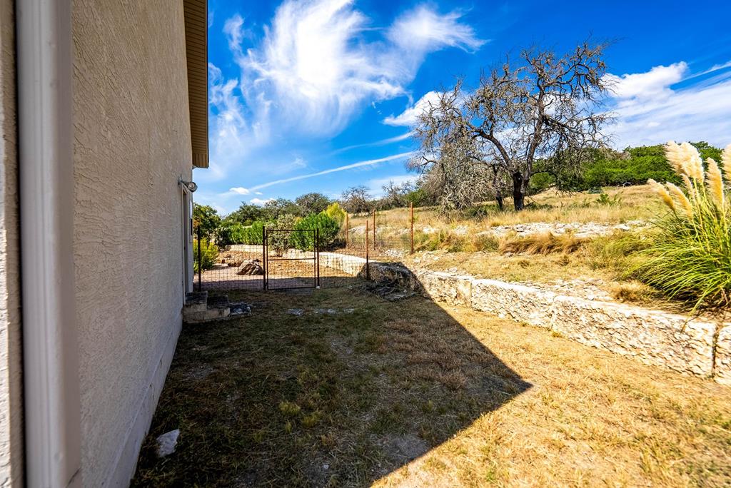 103 Cranbrook Court Ingram, TX 78025 - Photo 38 of 61 a view of a backyard