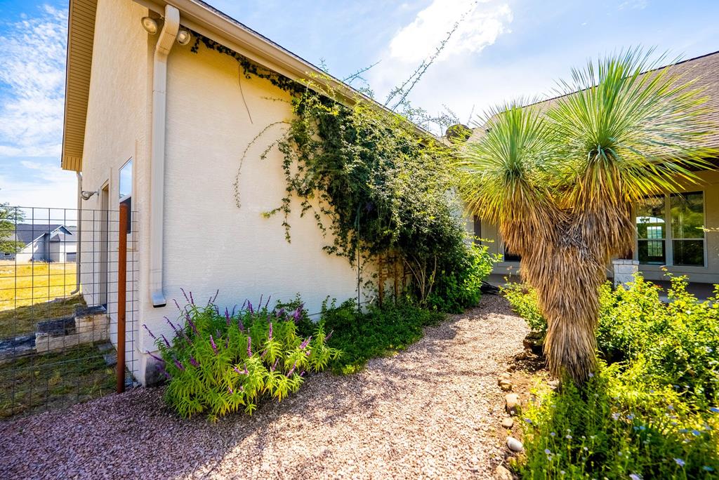 103 Cranbrook Court Ingram, TX 78025 - Photo 40 of 61 a view of a back yard of the house