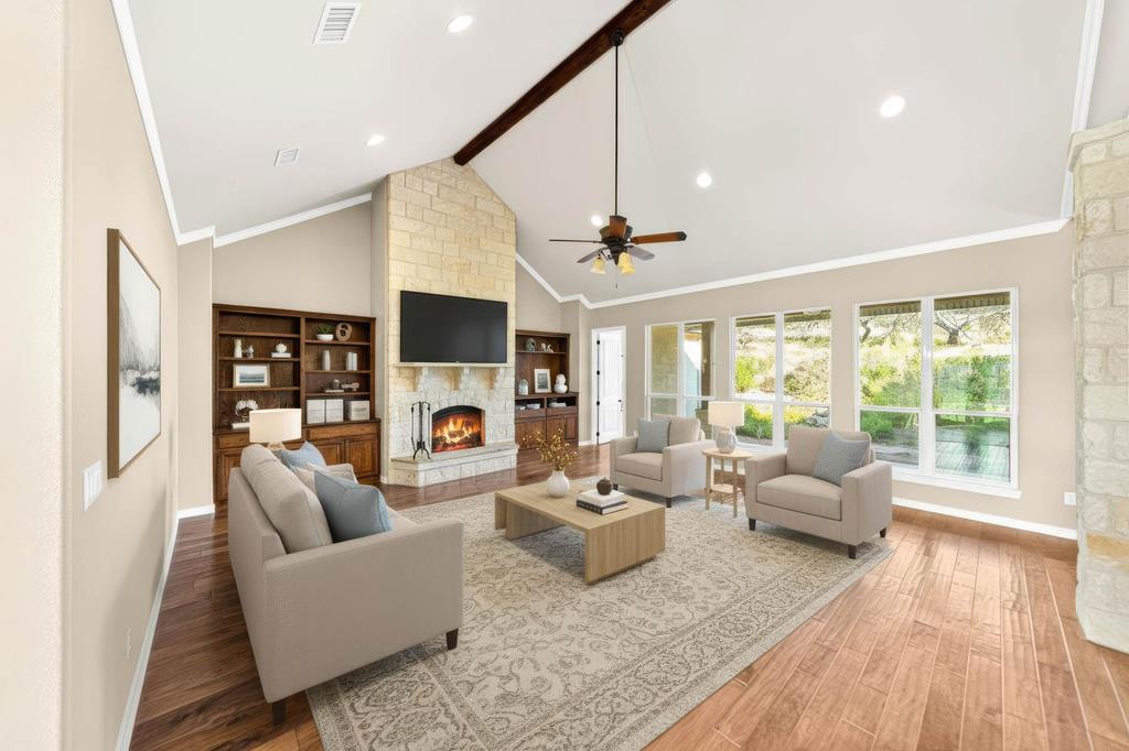 103 Cranbrook Court Ingram, TX 78025 - Photo 5 of 61 a living room with fireplace furniture and a large window