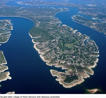 a view of a golf course with a lake