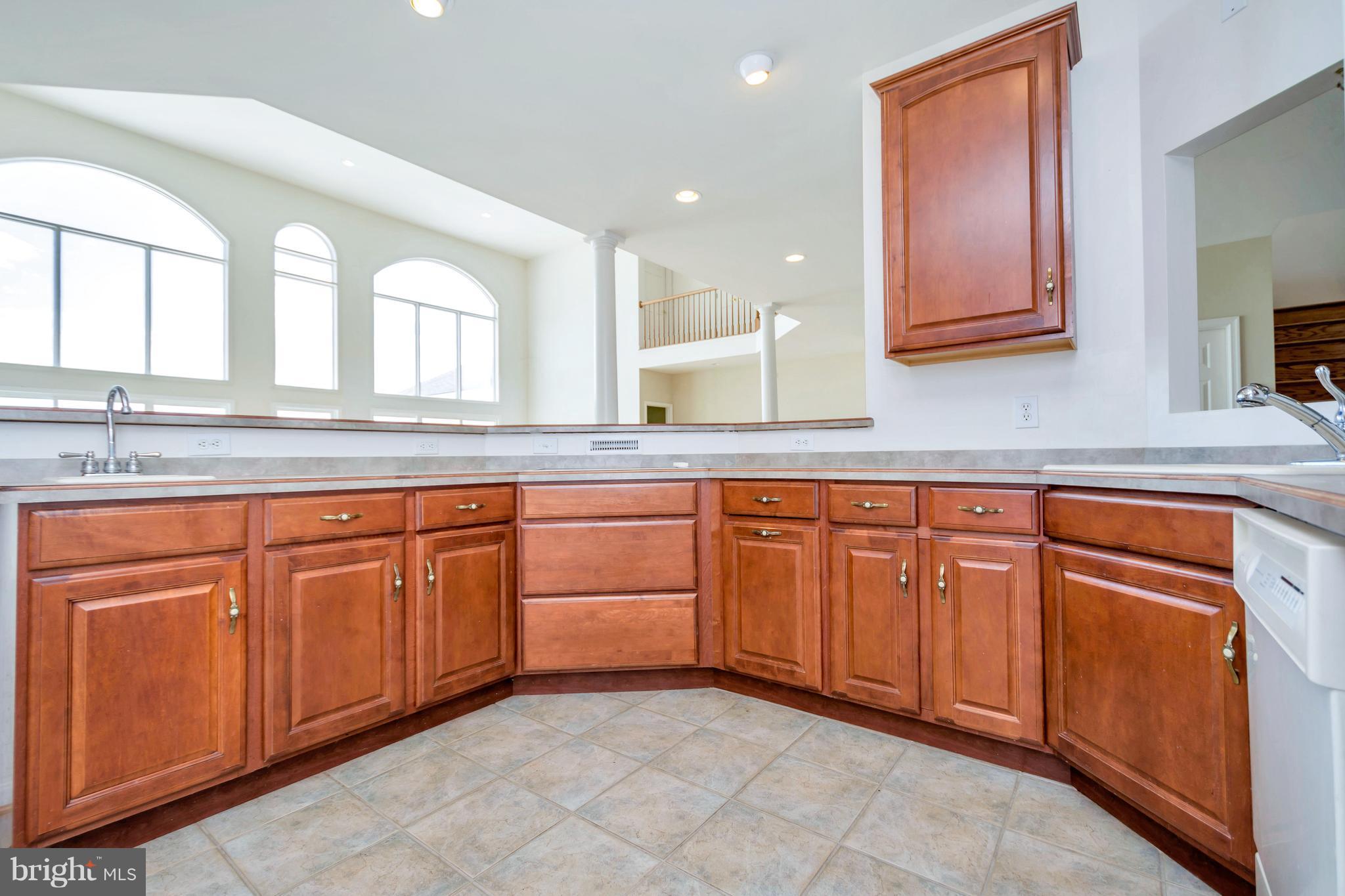 621 Marlborough Point Road Stafford, VA 22554 - Photo 23 of 30 a kitchen with granite countertop cabinets and sink