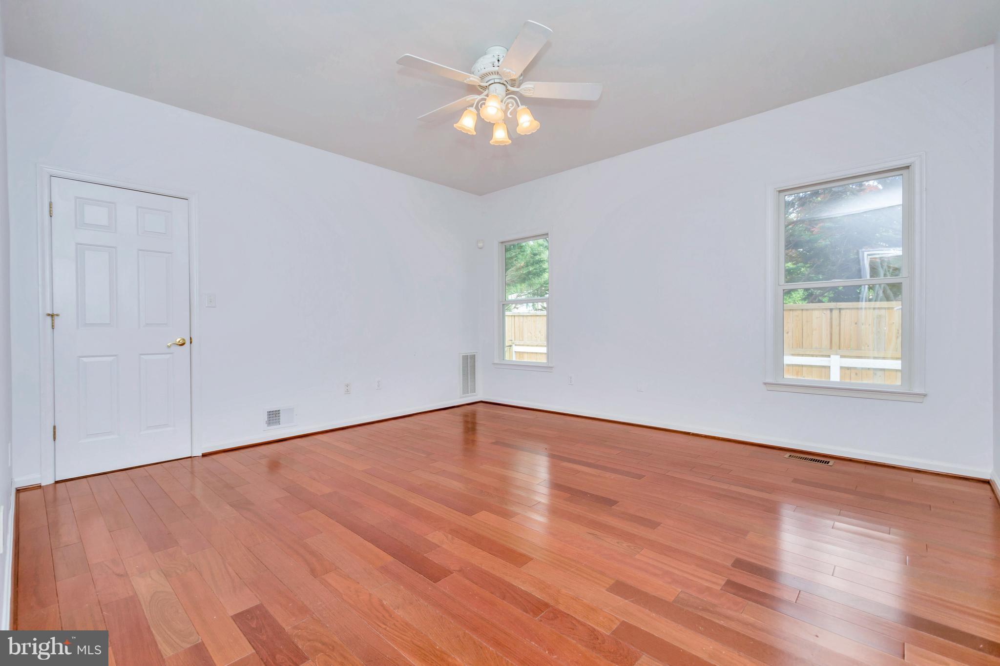 621 Marlborough Point Road Stafford, VA 22554 - Photo 24 of 30 wooden floor in an empty room with a window