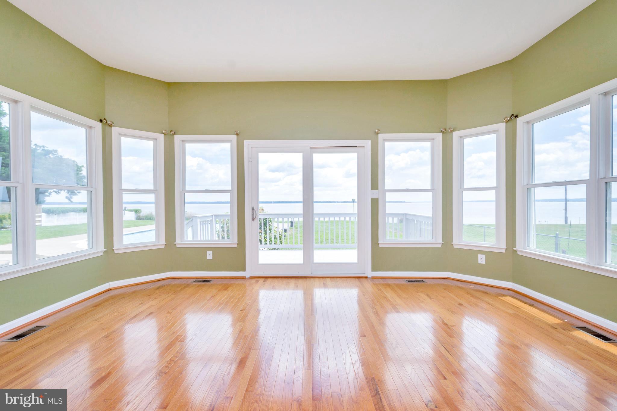 621 Marlborough Point Road Stafford, VA 22554 - Photo 25 of 30 a view of an empty room with a large window and kitchen view
