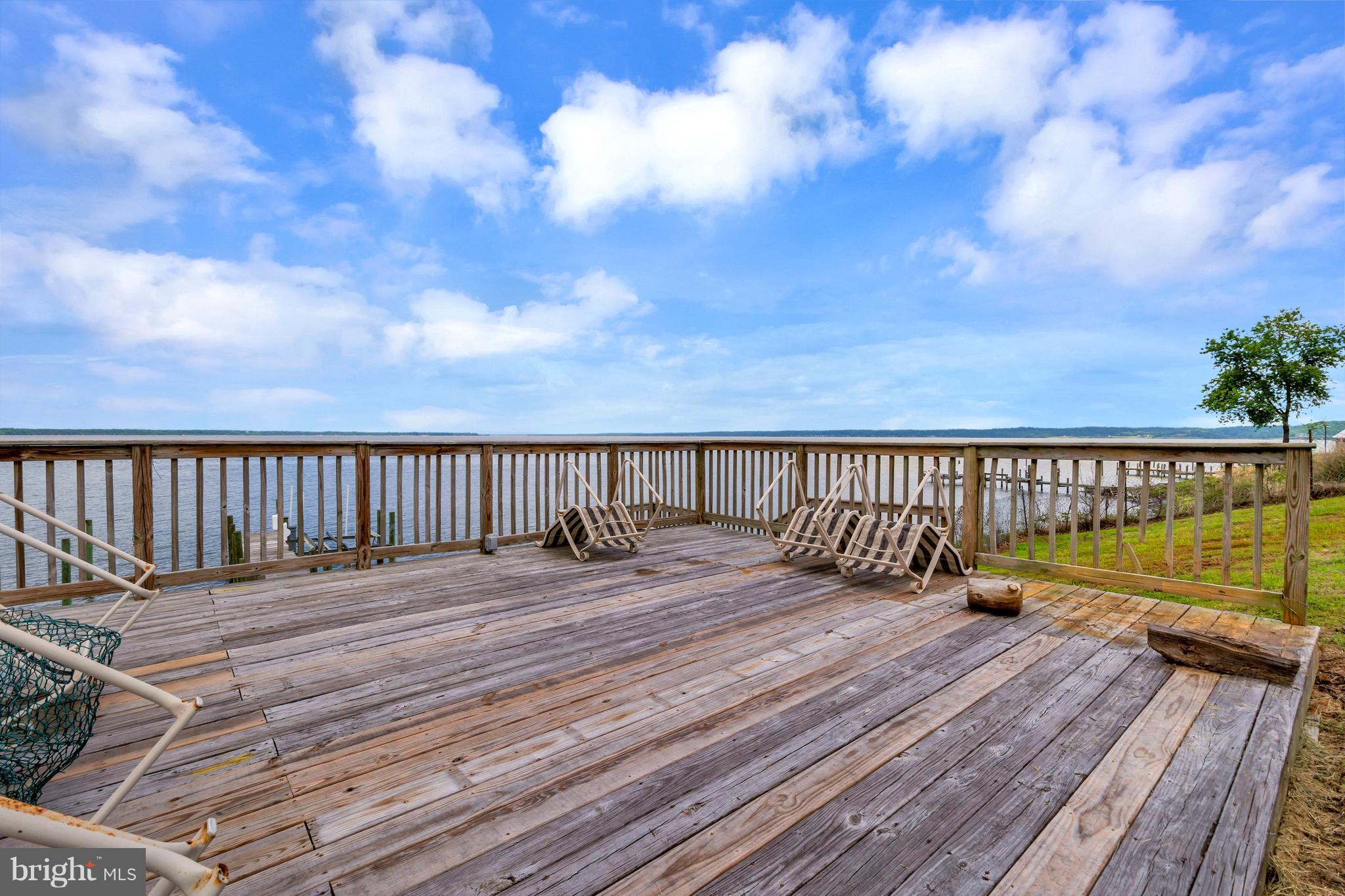 621 Marlborough Point Road Stafford, VA 22554 - Photo 9 of 30 a balcony with wooden floor and outdoor space