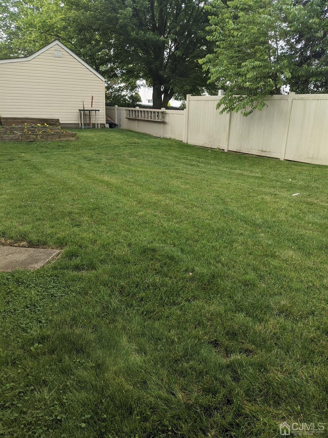 73 Highfield Road Colonia, NJ 07067 - Photo 16 of 16 a view of a backyard