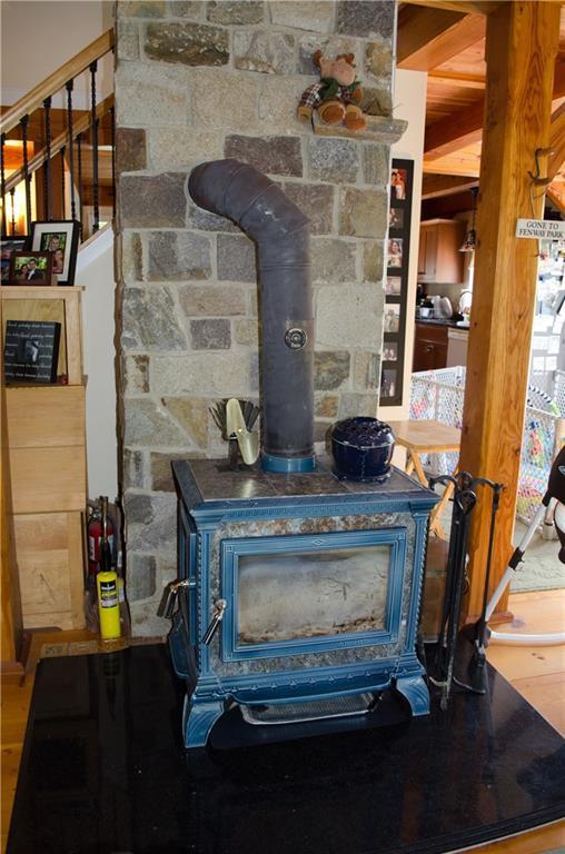 129 Lake Shore Road Holden, ME 04429 - Photo 4 of 29 Living room wood stove