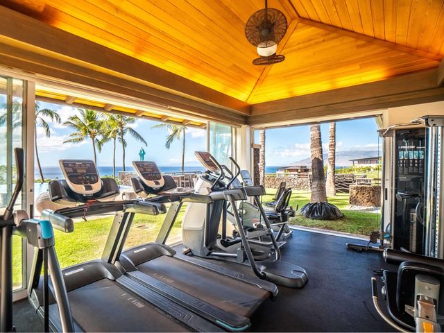 a view of a swimming pool with a table and chairs