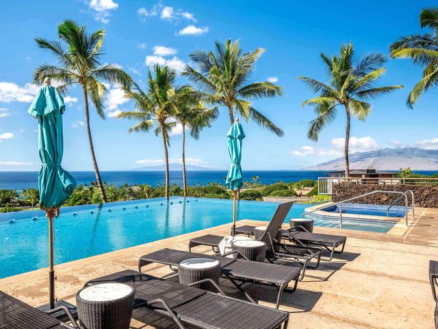 a street view with potted plants