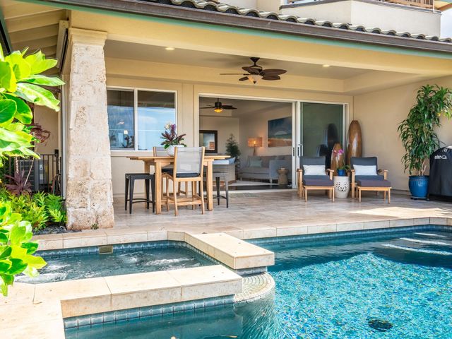 a view of a house with patio porch and sitting area