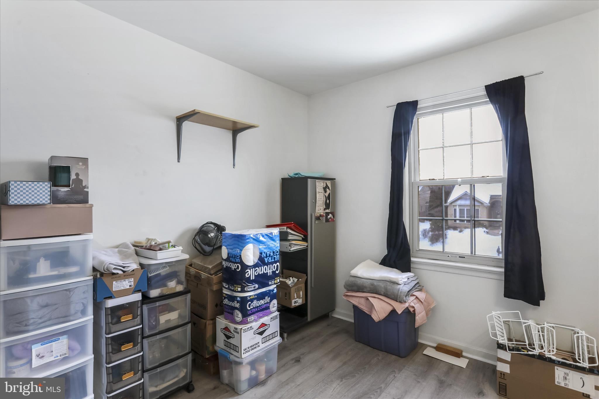 60 Morningside Drive Falling Waters, WV 25419 - Photo 23 of 45 a living room with a baby crib furniture and a flat screen tv