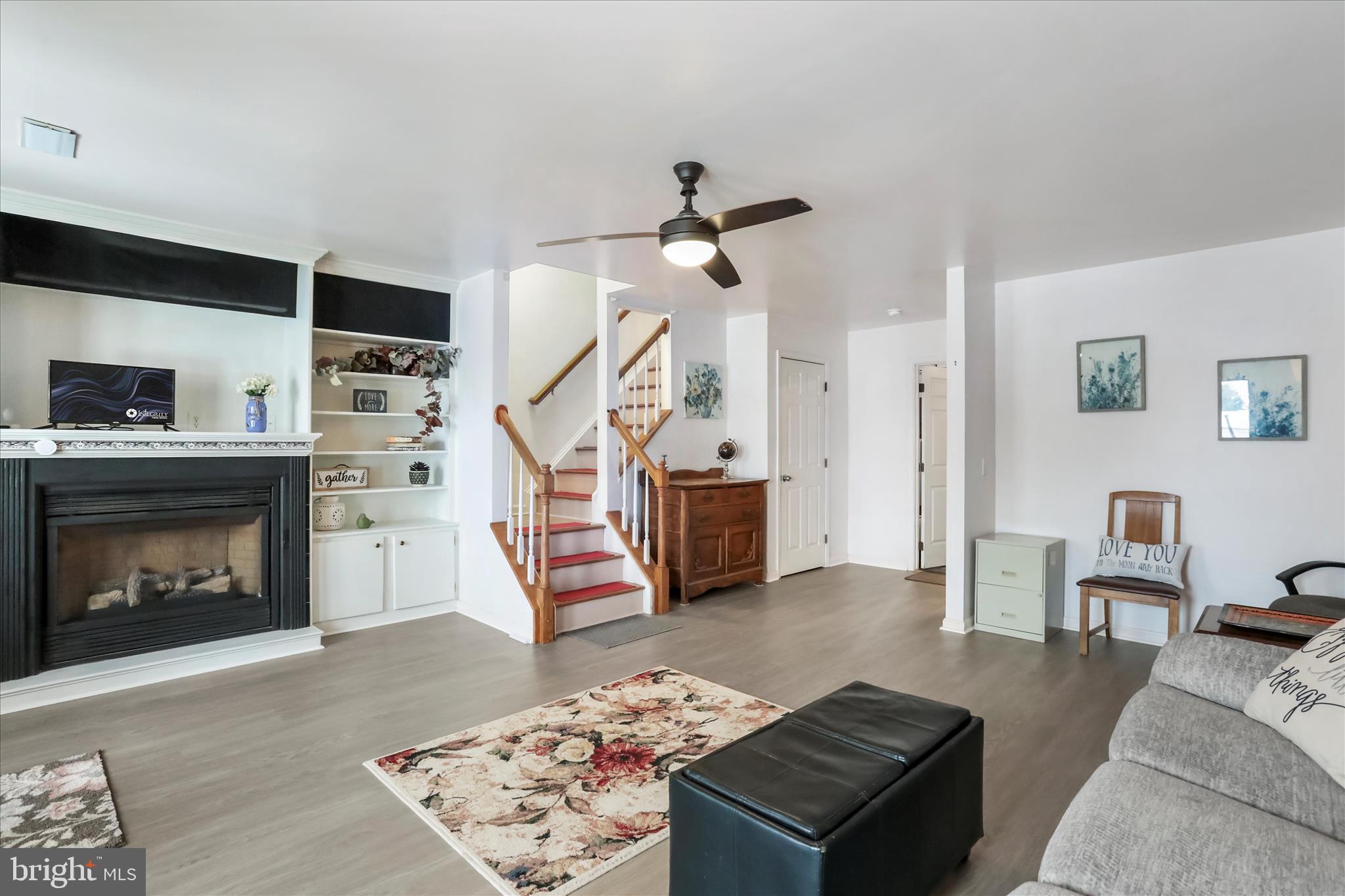 60 Morningside Drive Falling Waters, WV 25419 - Photo 29 of 45 a living room with furniture and a fireplace