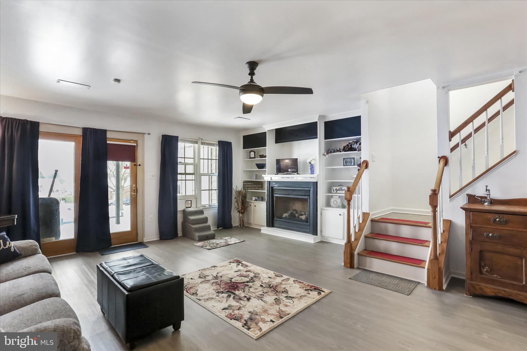 60 Morningside Drive Falling Waters, WV 25419 - Photo 30 of 45 a living room with furniture and a fireplace